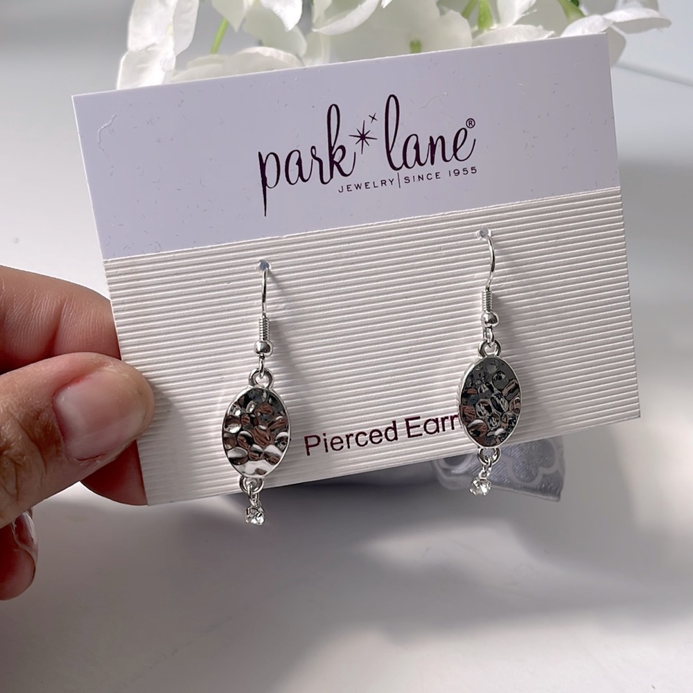 PARK LANE EARRINGS pierced silver, dangles with sparkling stone at the end.